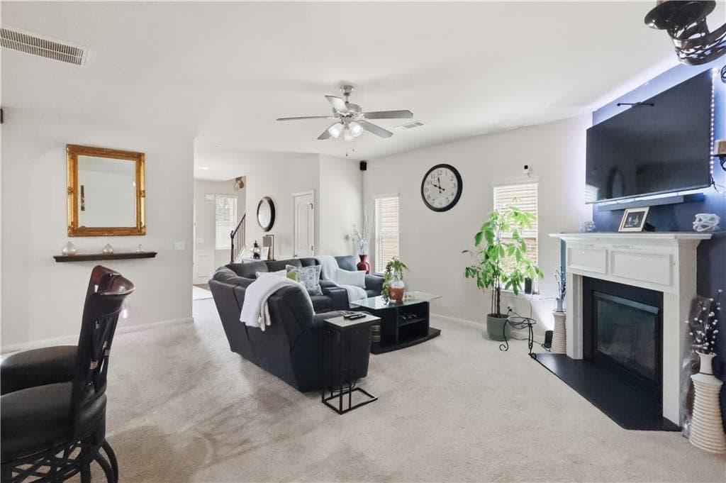 5 bedroom, 3 bathroom, 2,640 sq ft single family residence for sale at 7617 Bowhead Court, Fairburn, GA 30213 — photo 4
