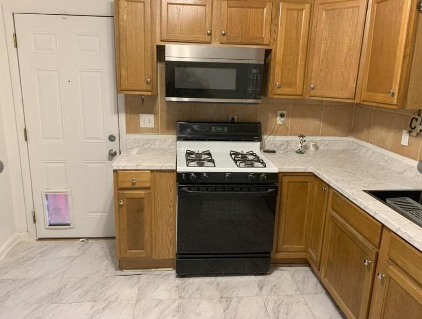 4 bedroom, 1 bathroom, 834 sq ft single family residence for sale at 1551 Ferno Drive, Atlanta, GA 30318 — photo 6