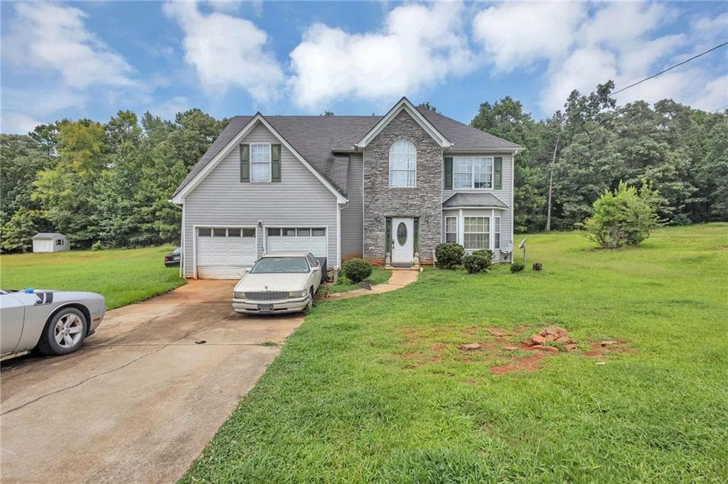 4 bedroom, 3 bathroom, 2,693 sq ft single family residence under contract at 547 Zoie Lane, Palmetto, GA 30268 — photo 2