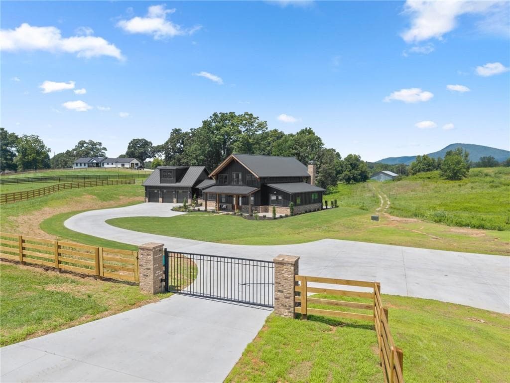 4 bedroom, 4 bathroom, 3,863 sq ft single family residence for sale at 5711 Cleveland Highway, Clermont, GA 30527