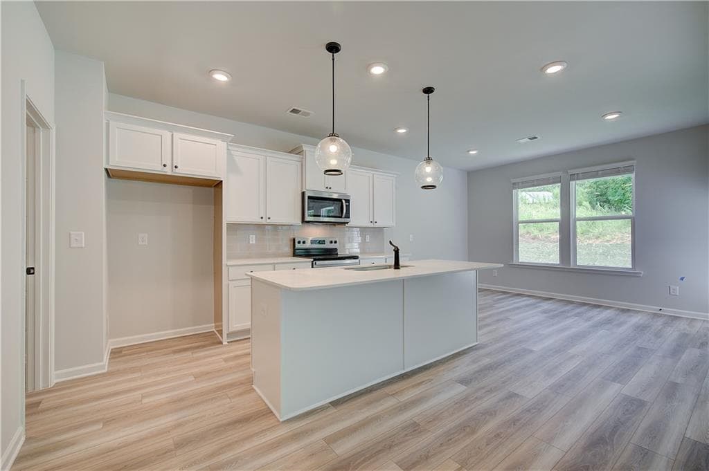 4 bedroom, 3 bathroom, 2,502 sq ft single family residence for sale at 225 St Annes Place, Covington, GA 30016 — photo 7