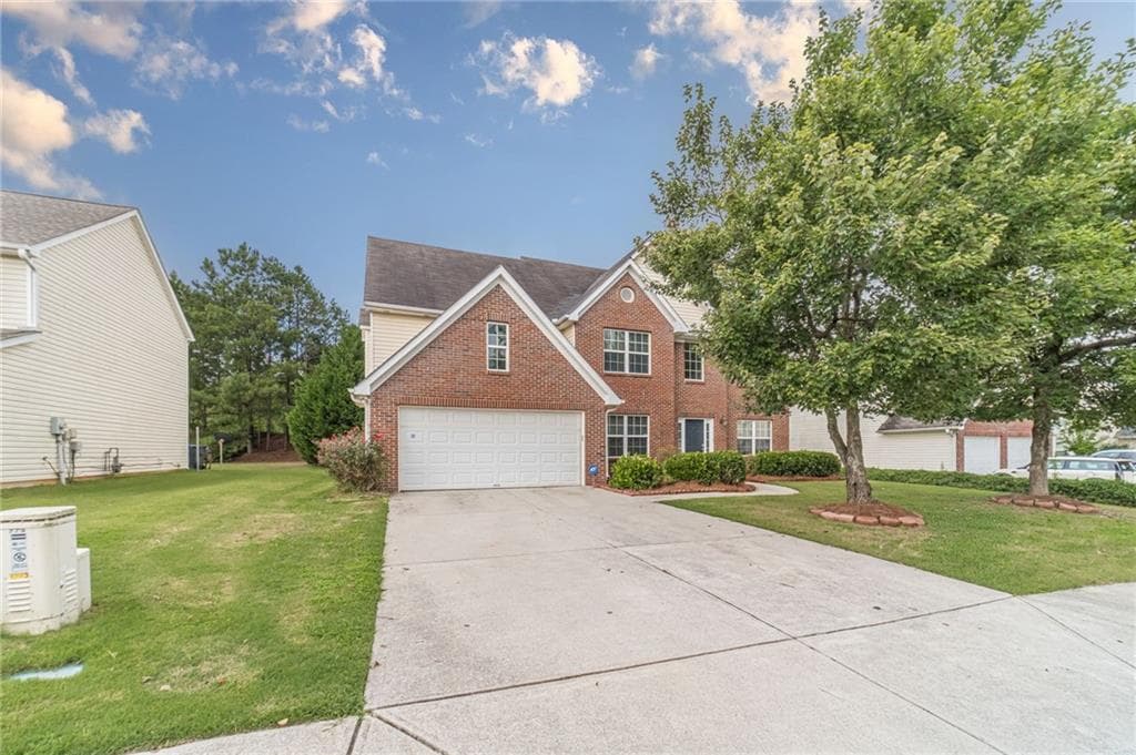 5 bedroom, 3 bathroom, 2,740 sq ft single family residence for sale at 769 Roxholly Lane, Buford, GA 30518 — photo 6