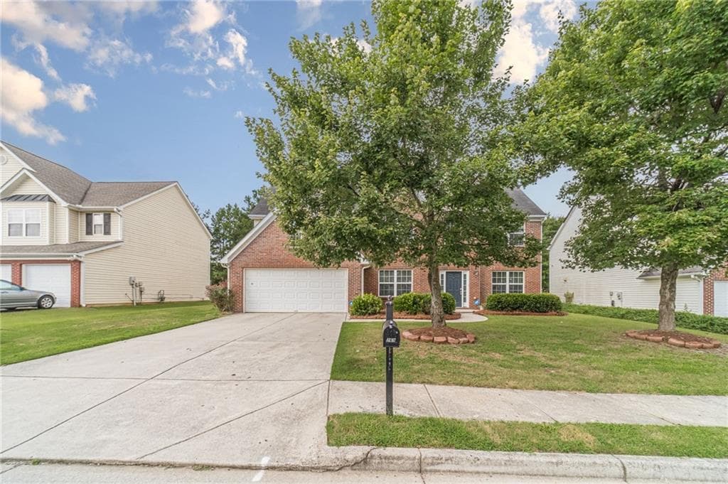 5 bedroom, 3 bathroom, 2,740 sq ft single family residence for sale at 769 Roxholly Lane, Buford, GA 30518 — photo 8