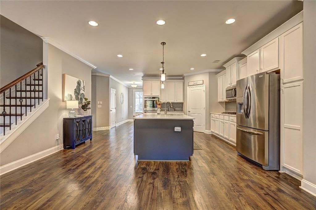 4 bedroom, 4 bathroom, 3,620 sq ft single family residence for sale at 4371 Thacker Lane, Suwanee, GA 30024 — photo 4