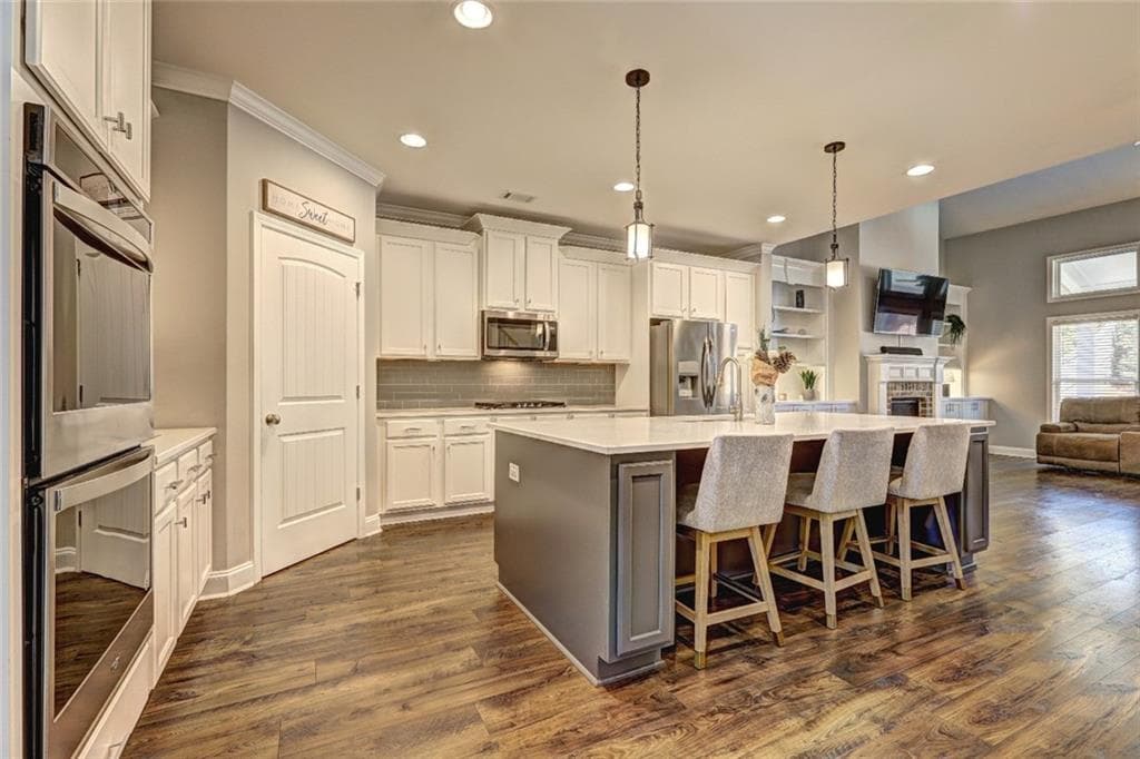 4 bedroom, 4 bathroom, 3,620 sq ft single family residence for sale at 4371 Thacker Lane, Suwanee, GA 30024 — photo 7