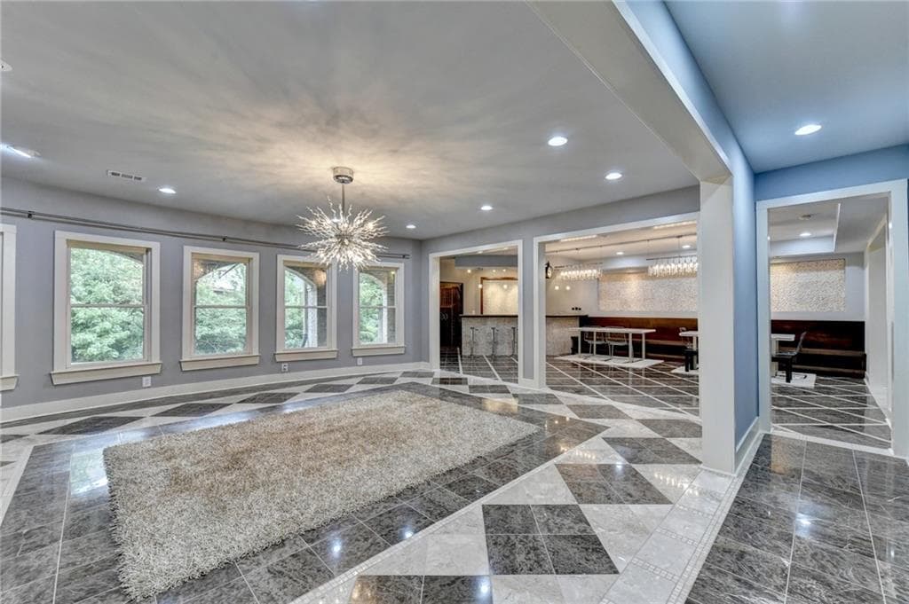 5 bedroom, 6 bathroom, 7,051 sq ft single family residence under contract at 8330 Royal Melbourne Way, Duluth, GA 30097 — photo 7