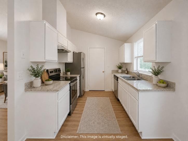 3 bedroom, 2 bathroom, 1,065 sq ft single family residence for sale at 2509 Corner Stone Trail, Decatur, GA 30034 — photo 4