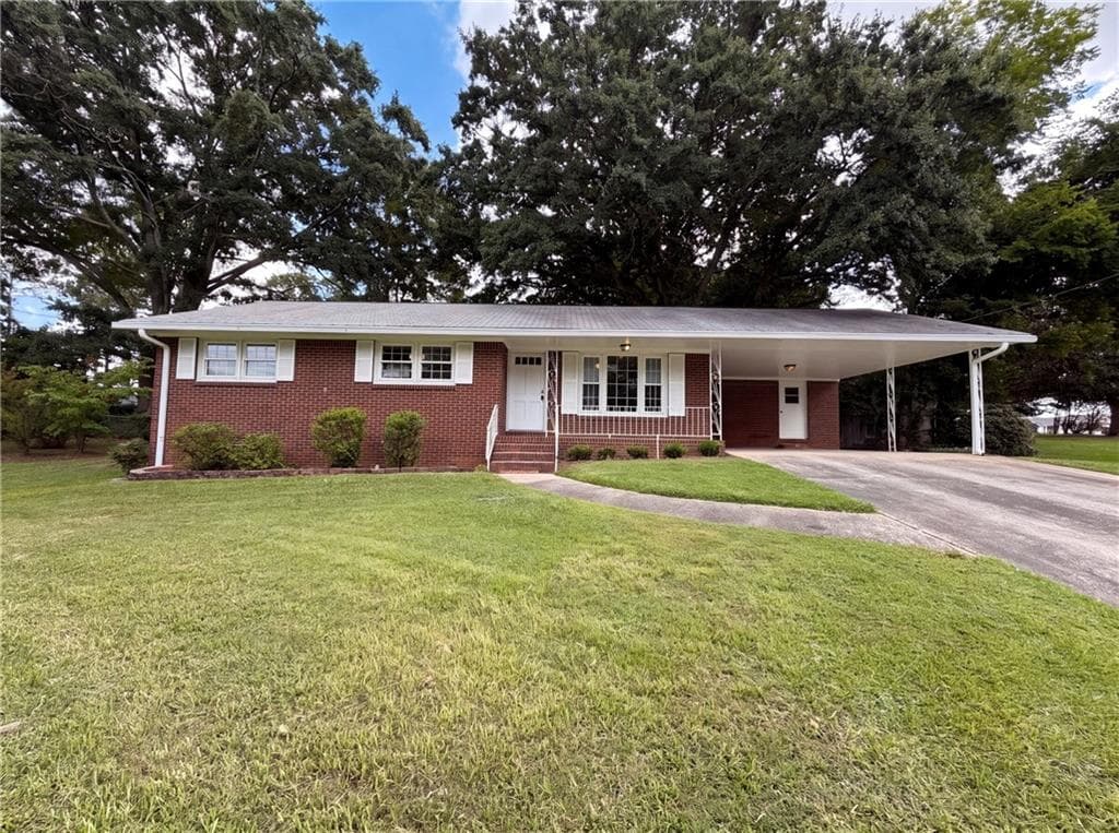 3 bedroom, 2 bathroom, 1,257 sq ft single family residence for sale at 1276 Robin Road, Conyers, GA 30012 — photo 1 of 20