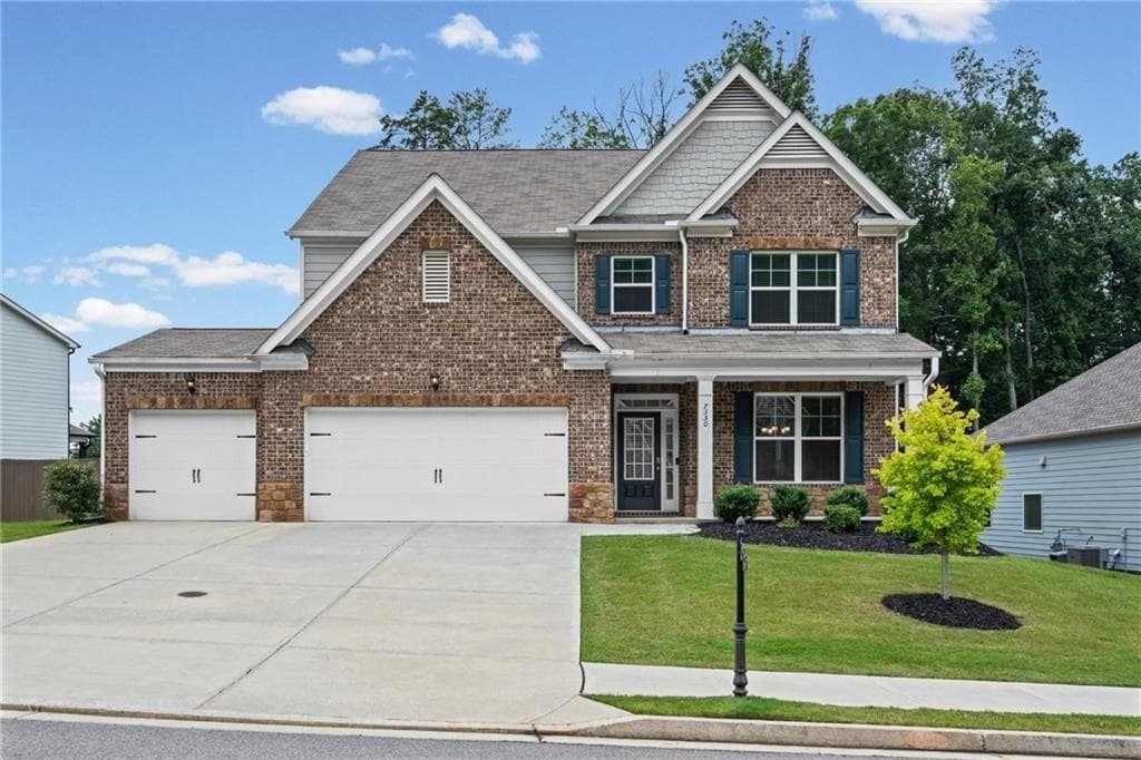 4 bedroom, 3 bathroom, 3,180 sq ft single family residence for sale at 7350 Rambling Vale, Cumming, GA 30028 — photo 1 of 59