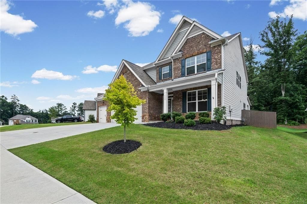 4 bedroom, 3 bathroom, 3,180 sq ft single family residence for sale at 7350 Rambling Vale, Cumming, GA 30028 — photo 3