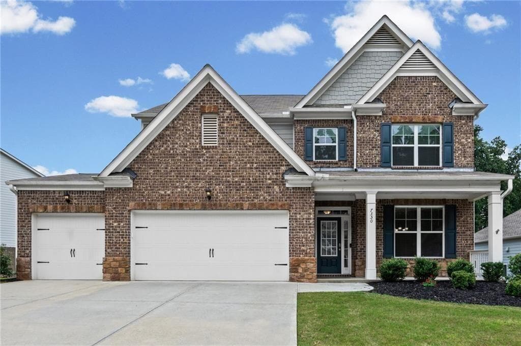 4 bedroom, 3 bathroom, 3,180 sq ft single family residence for sale at 7350 Rambling Vale, Cumming, GA 30028 — photo 4