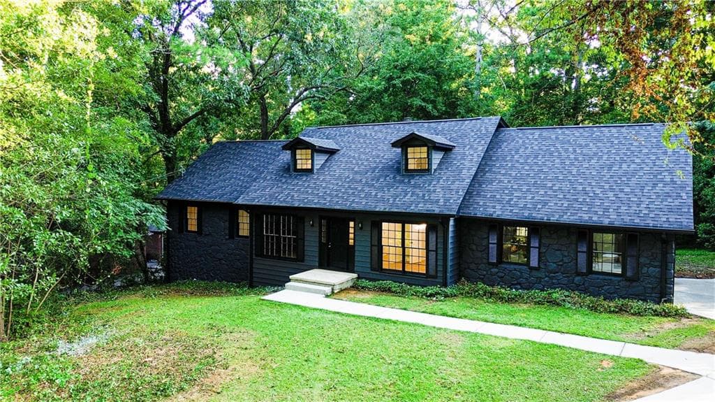 4 bedroom, 3 bathroom, 2,296 sq ft single family residence for sale at 4877 Alpine Dr, Lilburn, GA 30047 — photo 2
