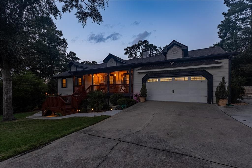 5 bedroom, 3 bathroom, 3,298 sq ft single family residence for sale at 2390 Stone Drive SW, Lilburn, GA 30047 — photo 2
