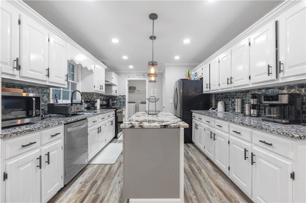 5 bedroom, 3 bathroom, 3,298 sq ft single family residence for sale at 2390 Stone Drive SW, Lilburn, GA 30047 — photo 10