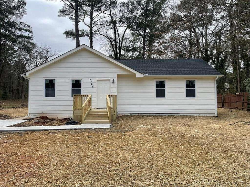 4 bedroom, 3 bathroom, 1,664 sq ft single family residence for sale at 5385 BOOKER T Drive, Morrow, GA 30260 — photo 1 of 9