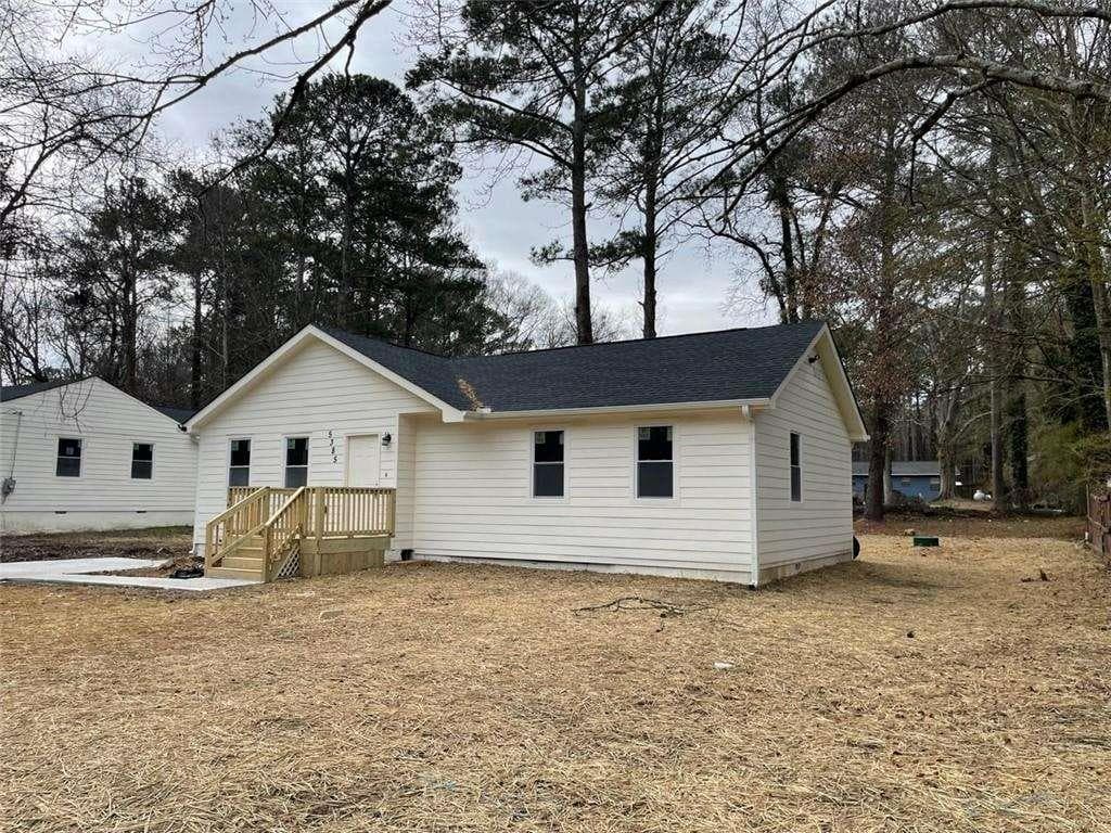 4 bedroom, 3 bathroom, 1,664 sq ft single family residence for sale at 5385 BOOKER T Drive, Morrow, GA 30260 — photo 3