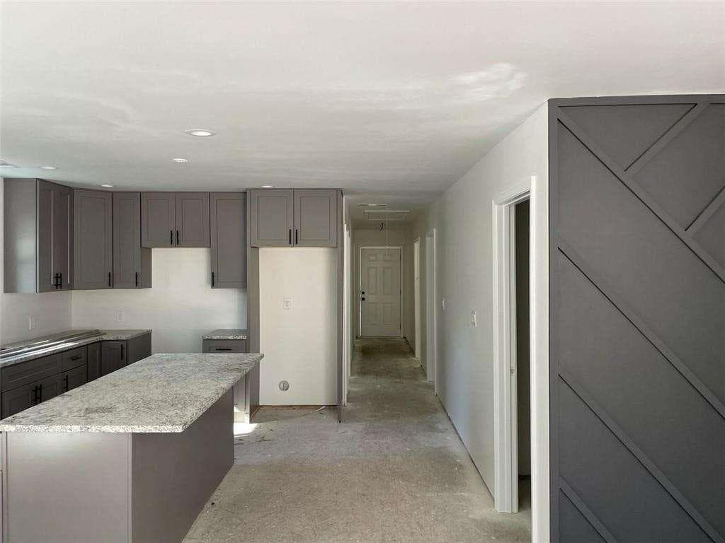 4 bedroom, 3 bathroom, 1,664 sq ft single family residence for sale at 5385 BOOKER T Drive, Morrow, GA 30260 — photo 5
