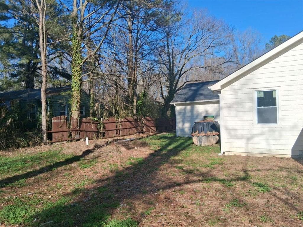 4 bedroom, 3 bathroom, 1,664 sq ft single family residence for sale at 5385 BOOKER T Drive, Morrow, GA 30260 — photo 9