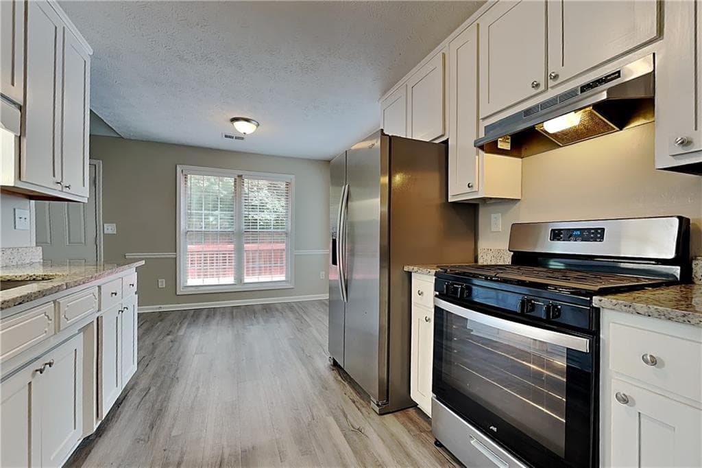 4 bedroom, 3 bathroom, 2,056 sq ft single family residence for rent at 21 Leighs Grove Way, Grayson, GA 30017 for $2,295 a month — photo 6
