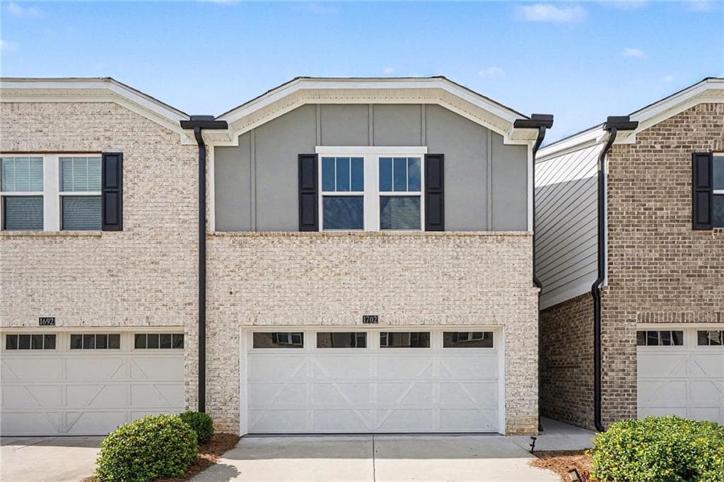 3 bedroom, 3 bathroom, 1,888 sq ft townhouse for sale at 1702 Villageside Court, Lawrenceville, GA 30043 — photo 1 of 35