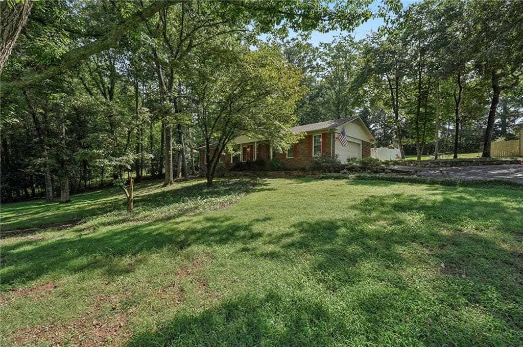 3 bedroom, 2 bathroom, 1,450 sq ft single family residence for sale at 1025 Greenwood Acres Drive, Cumming, GA 30040 — photo 3