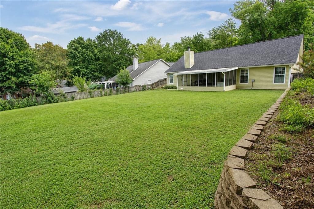 4 bedroom, 2 bathroom, 1,668 sq ft single family residence for sale at 5165 Sterling Trace Court, Lilburn, GA 30047 — photo 6