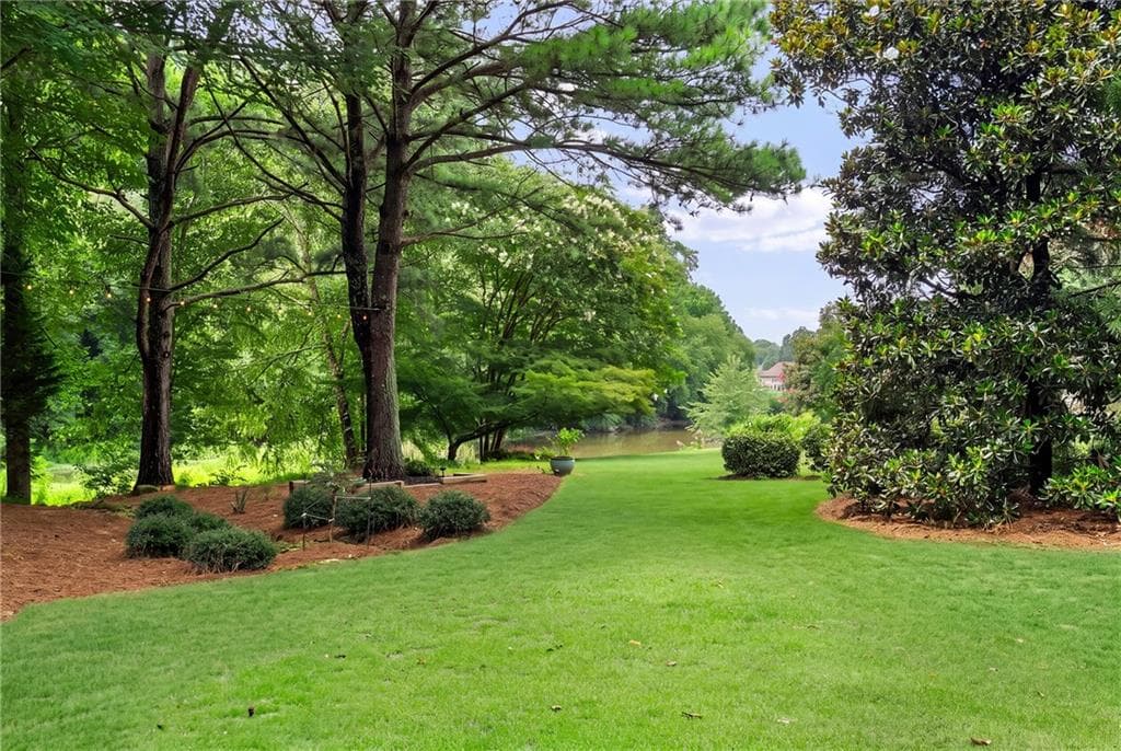 5 bedroom, 4 bathroom, 5,695 sq ft single family residence under contract at 710 Lake Medlock Drive, Johns Creek, GA 30022 — photo 2