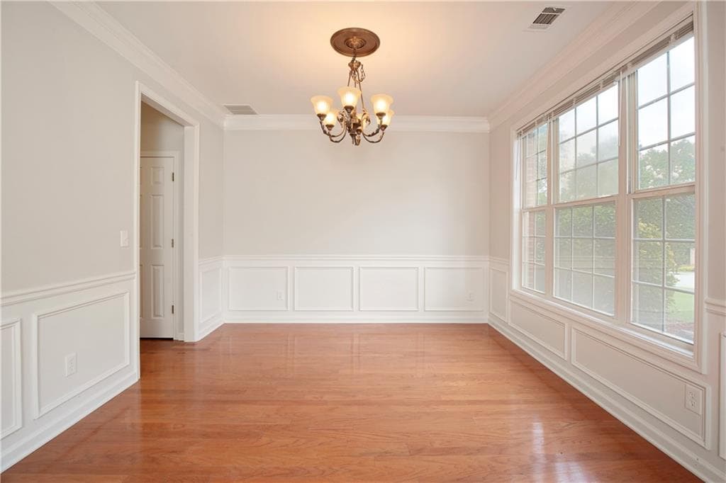 4 bedroom, 3 bathroom, 2,628 sq ft single family residence for sale at 3820 Devenwood Way, Buford, GA 30519 — photo 4
