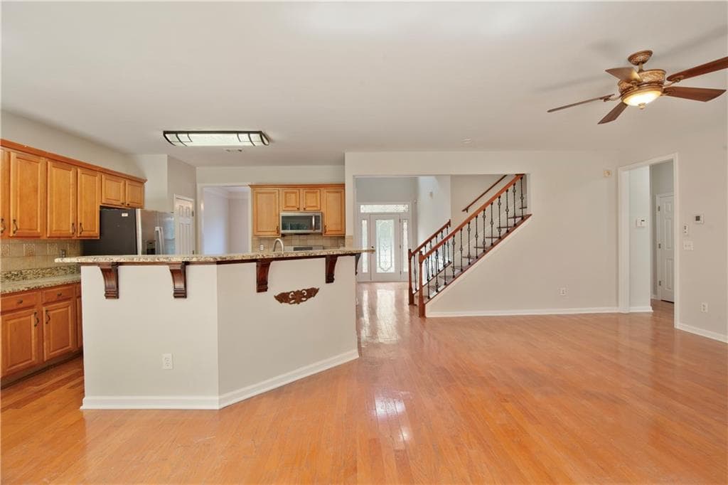 4 bedroom, 3 bathroom, 2,628 sq ft single family residence for sale at 3820 Devenwood Way, Buford, GA 30519 — photo 6