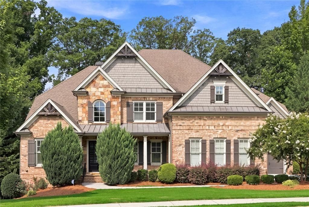 5 bedroom, 6 bathroom, 6,865 sq ft single family residence for sale at 1992 Stonewater Court, Hoschton, GA 30548 — photo 1 of 46