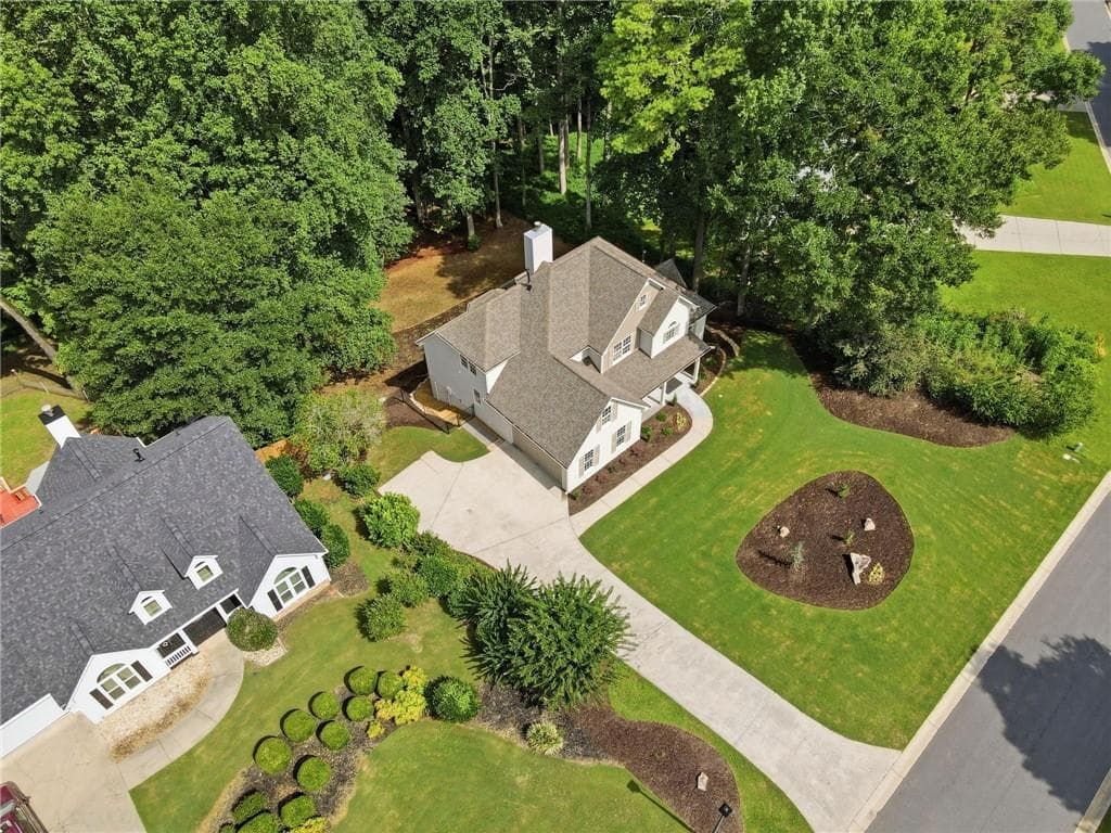 6 bedroom, 4 bathroom, 3,349 sq ft single family residence for sale at 9370 Eagles Landing Drive, Gainesville, GA 30506 — photo 4