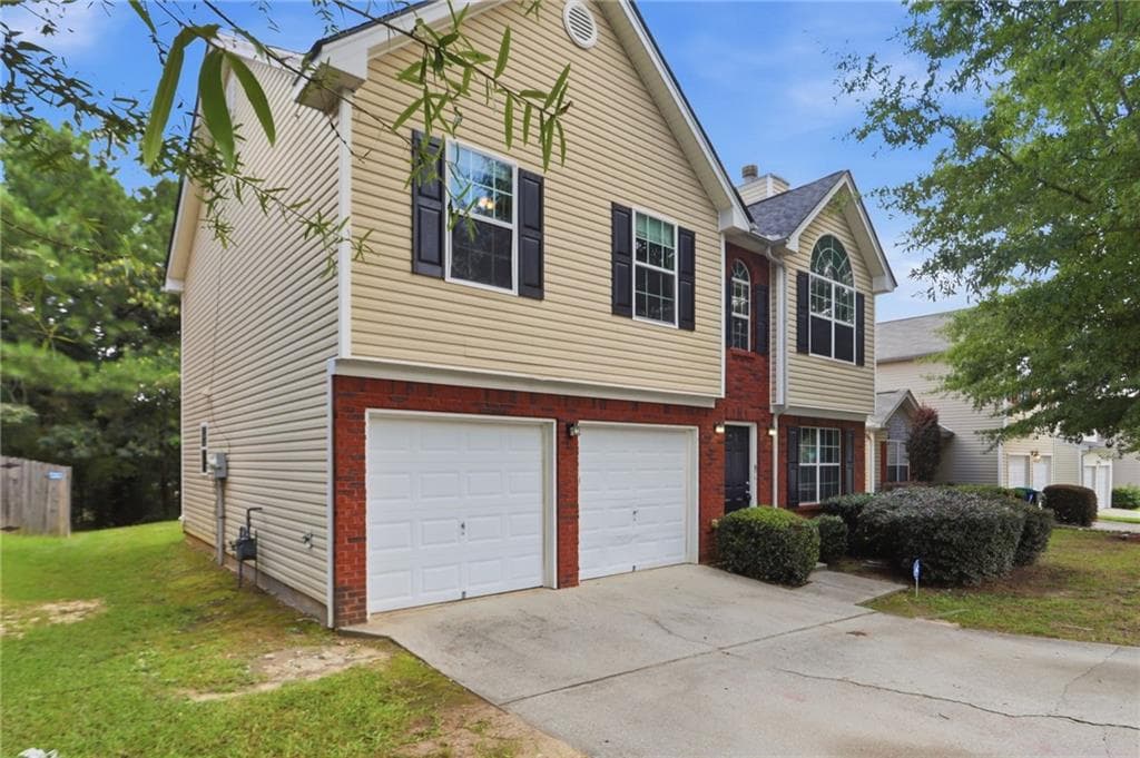 4 bedroom, 3 bathroom, 1,938 sq ft single family residence for sale at 2545 Carolina Ridge, Riverdale, GA 30296 — photo 2