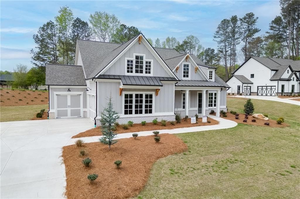 4 bedroom, 4 bathroom, 3,440 sq ft single family residence for sale at 8155 Heardsville Court, Cumming, GA 30028 — photo 2