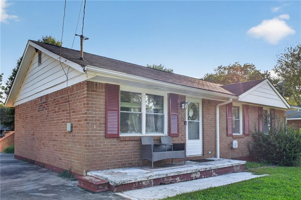 3 bedroom, 1 bathroom, 1,040 sq ft single family residence for sale at 8341 Kendrick Road, Jonesboro, GA 30238 — photo 3