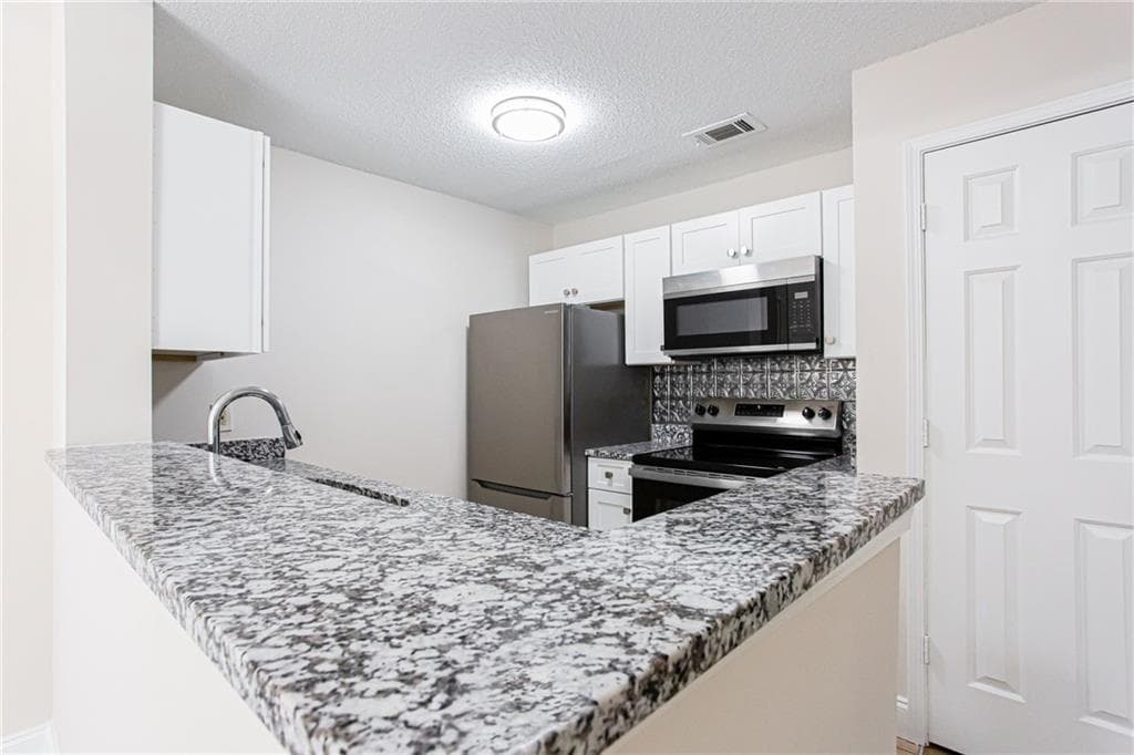 1 bedroom, 1 bathroom, 720 sq ft condominium for sale at 1075 Peachtree Walk A312, Atlanta, GA 30309 — photo 8