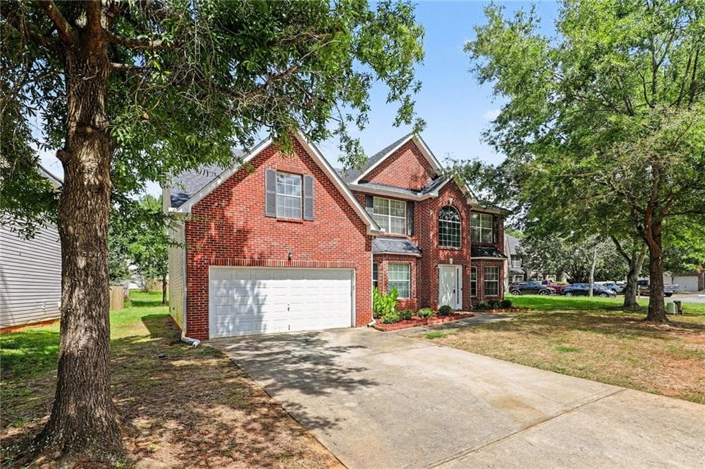 5 bedroom, 3 bathroom, 3,158 sq ft single family residence for sale at 373 Kentwood Springs Drive, Hampton, GA 30228 — photo 2