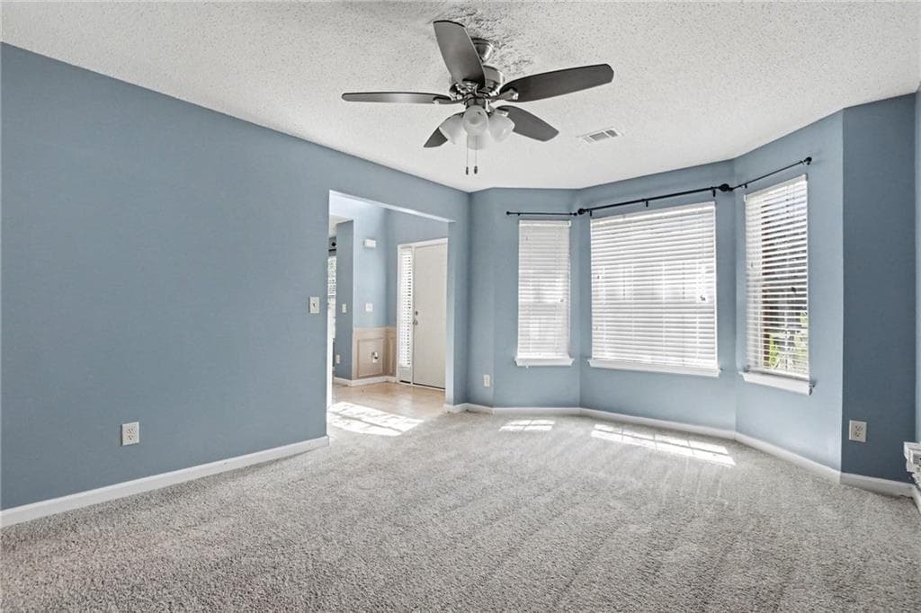 5 bedroom, 3 bathroom, 3,158 sq ft single family residence for sale at 373 Kentwood Springs Drive, Hampton, GA 30228 — photo 5