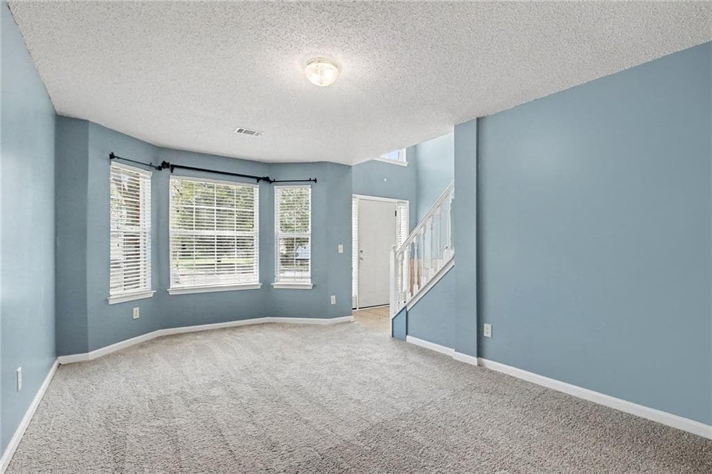 5 bedroom, 3 bathroom, 3,158 sq ft single family residence for sale at 373 Kentwood Springs Drive, Hampton, GA 30228 — photo 6