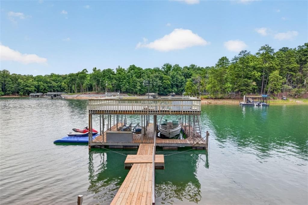 4 bedroom, 4 bathroom, 6,831 sq ft single family residence for sale at 5960 Nachoochee Trail, Flowery Branch, GA 30542 — photo 4