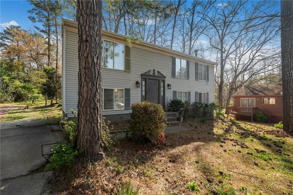 4 bedroom, 4 bathroom, 2,080 sq ft single family residence for sale at 3274 Adelade Court, Lithonia, GA 30038 — photo 2