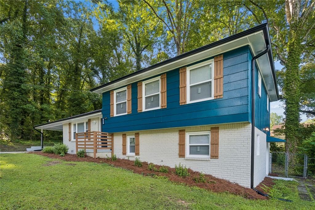 4 bedroom, 3 bathroom, 1,768 sq ft single family residence for sale at 499 Queen Aliese Lane, Jonesboro, GA 30236 — photo 2