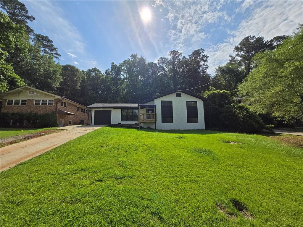 4 bedroom, 3 bathroom, 2,008 sq ft single family residence for sale at 2400 Glenrock Drive, Decatur, GA 30032 — photo 2
