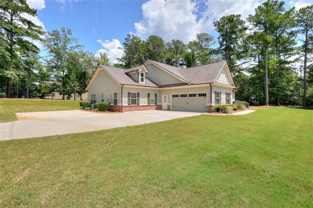 4 bedroom, 3 bathroom, 2,291 sq ft single family residence for sale at 1414 Maple Cove Lane, Loganville, GA 30052 — photo 2