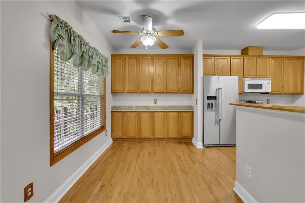 4 bedroom, 3 bathroom, 2,583 sq ft single family residence for sale at 3121 Wildwood Road, Suwanee, GA 30024 — photo 10