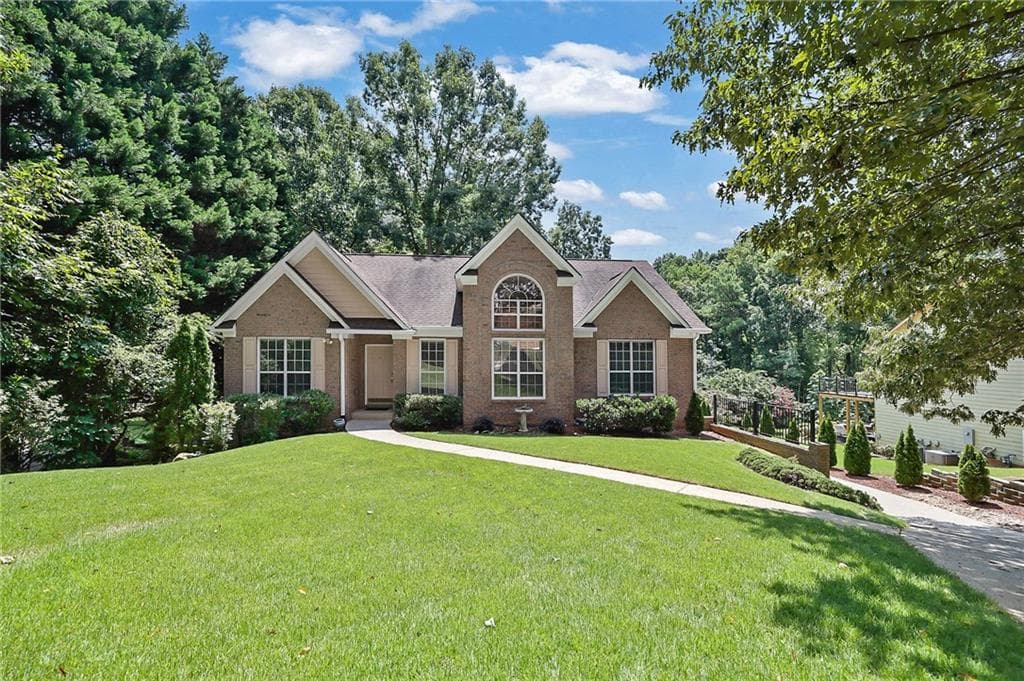 4 bedroom, 3 bathroom, 2,583 sq ft single family residence for sale at 3121 Wildwood Road, Suwanee, GA 30024 — photo 2