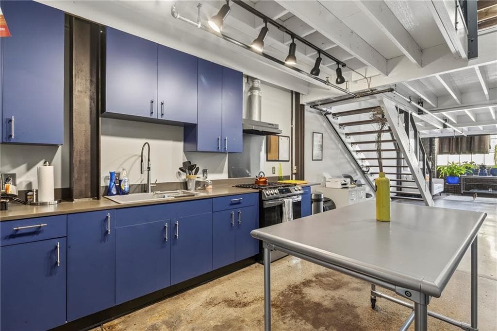 1 bedroom, 1 bathroom, 2,069 sq ft condominium for sale at 887 W Marietta Street S105, Atlanta, GA 30318 — photo 2