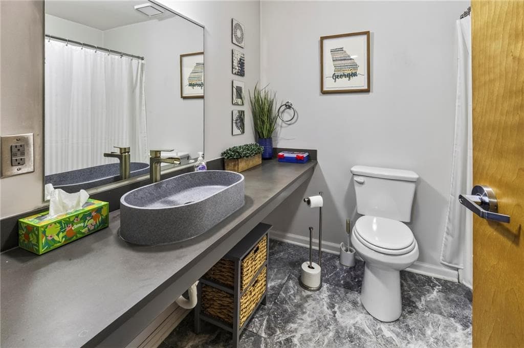 1 bedroom, 1 bathroom, 2,069 sq ft condominium for sale at 887 W Marietta Street S105, Atlanta, GA 30318 — photo 9