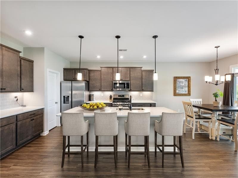 4 bedroom, 2 bathroom, 2,076 sq ft single family residence for sale at 627 Michigan Circle, Hoschton, GA 30548 — photo 4
