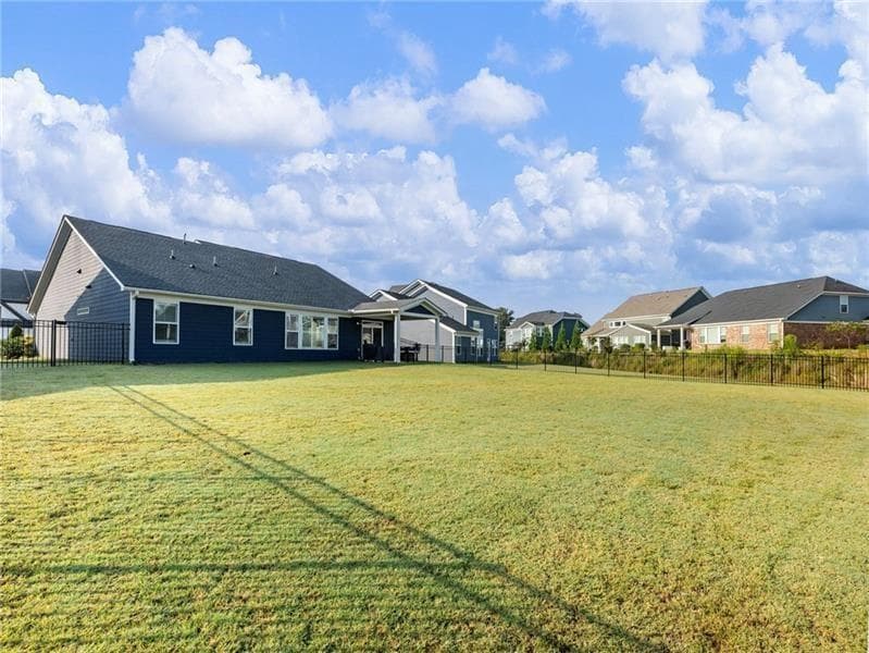 4 bedroom, 2 bathroom, 2,076 sq ft single family residence for sale at 627 Michigan Circle, Hoschton, GA 30548 — photo 2