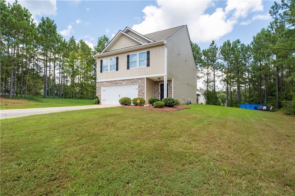 4 bedroom, 3 bathroom, 1,933 sq ft single family residence under contract at 105 Oakbrook Lane, Covington, GA 30016 — photo 5